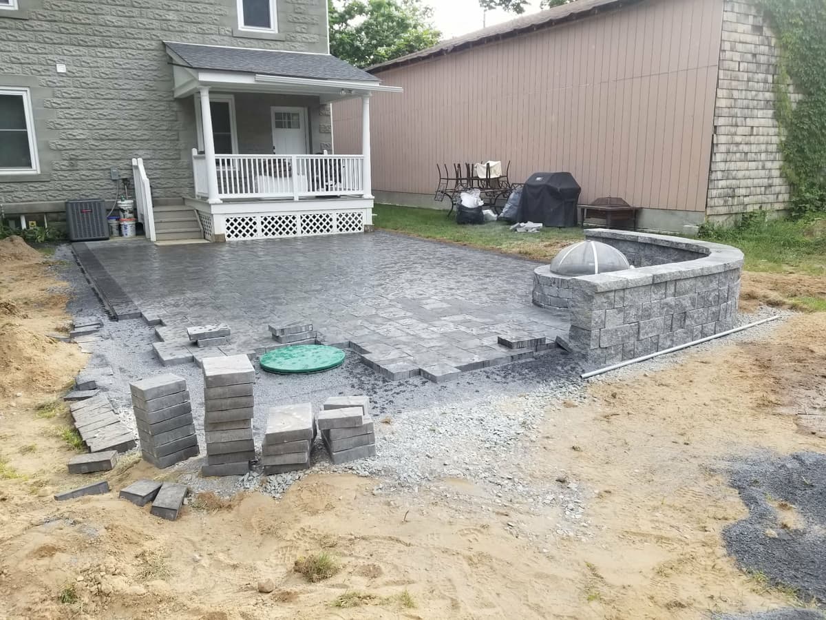 Paver patio with seating wall in progress